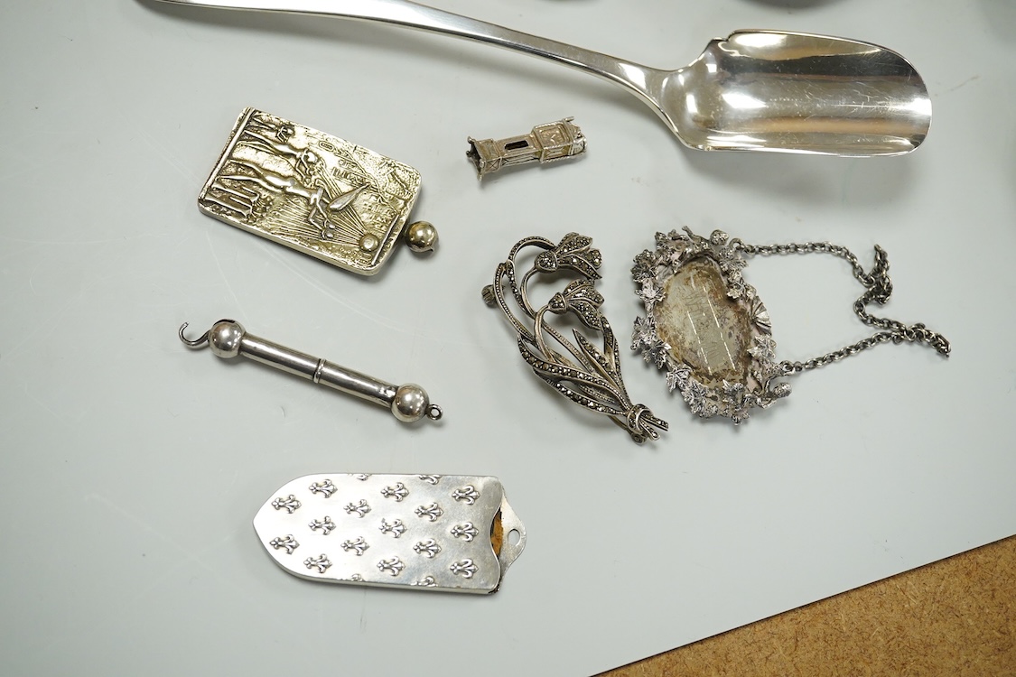 A collection of assorted small silver, including set of six 1930's coffee spoons, a mounted travelling pocket watch case, Victorian pepperette, mounted glass dwarf candlestick, enamelled powder box, Georgian stilton scoo